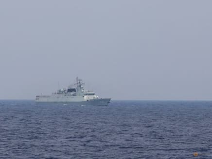 FILE PHOTO: A Chinese navy ship is seen sailing in the South China Sea, October 4, 2023. REUTERS/Adrian Portugal/File Photo